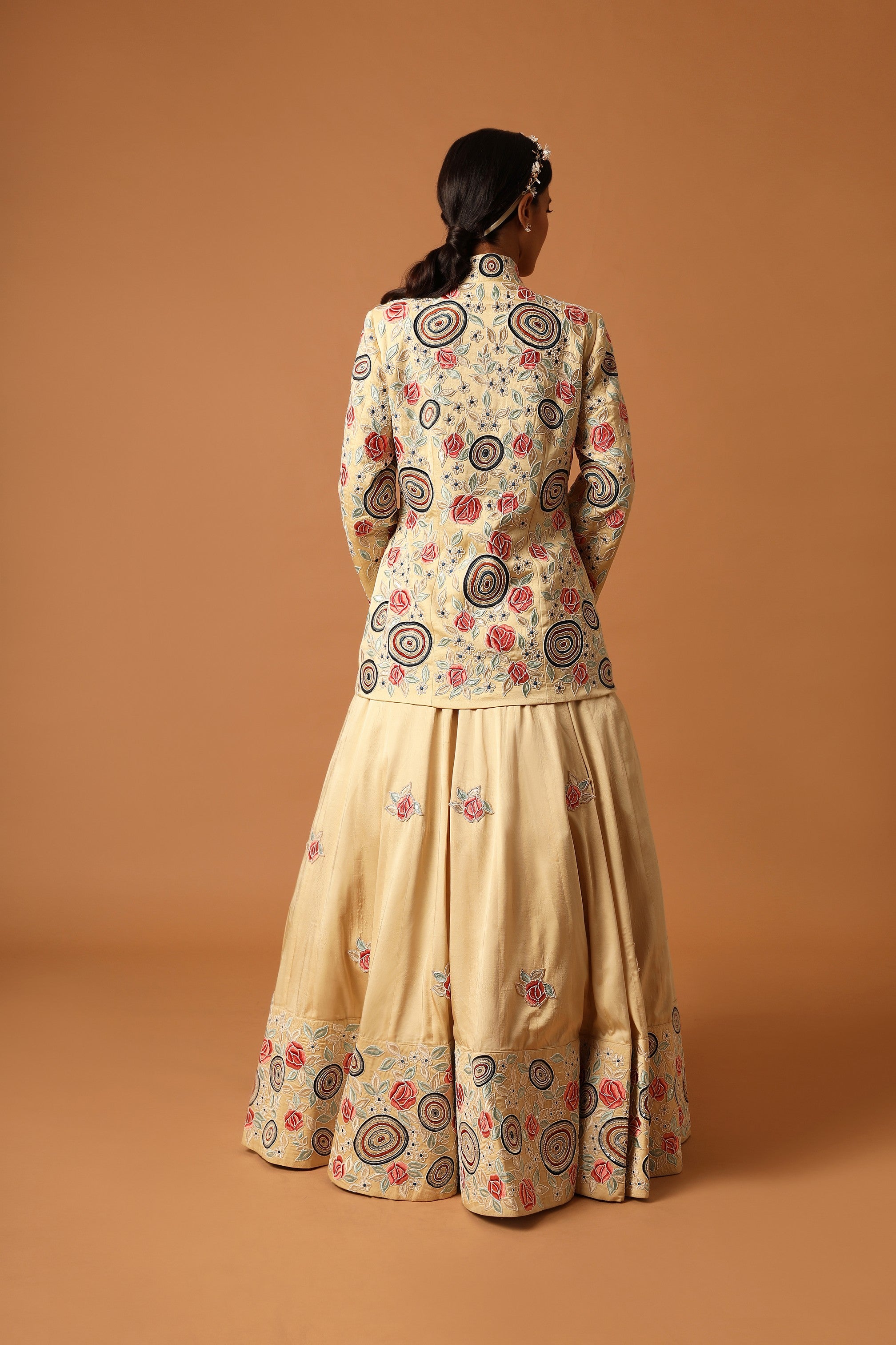 beige embroidered jacket with lehenga and dupatta