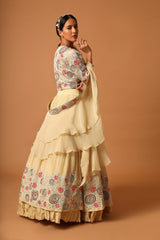 Beige embroidered blouse with gathered lehenga and dupatta