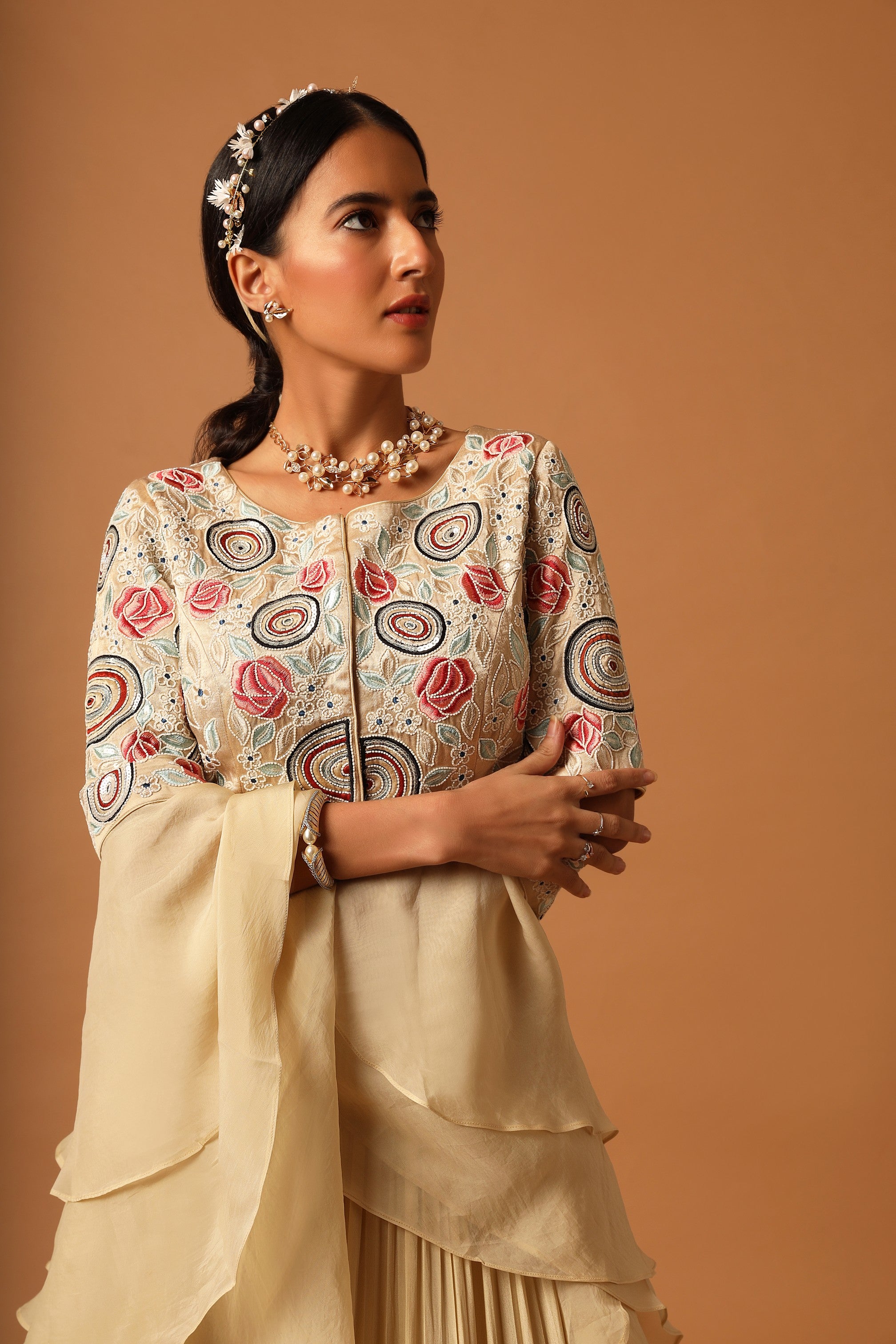 Beige embroidered blouse with gathered lehenga and dupatta