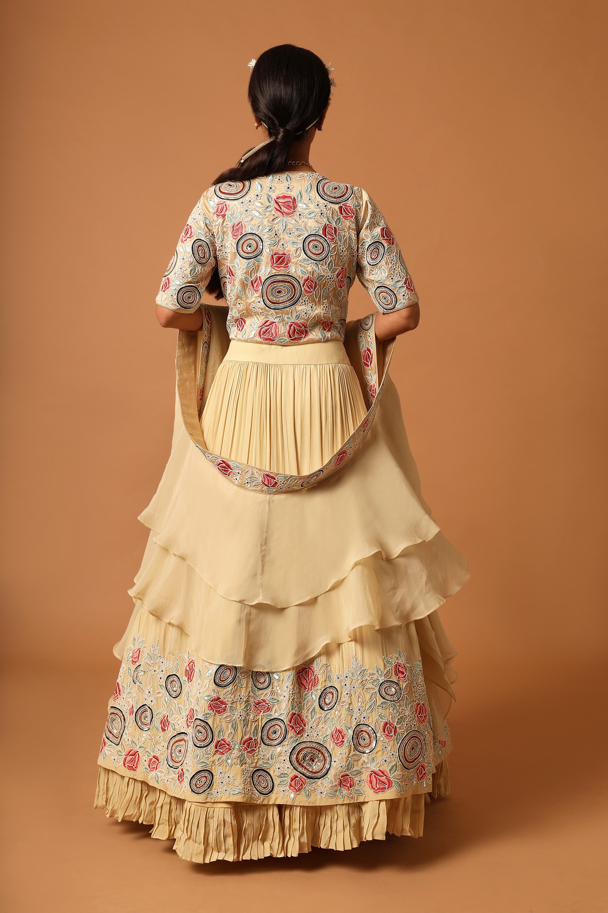 Beige embroidered blouse with gathered lehenga and dupatta