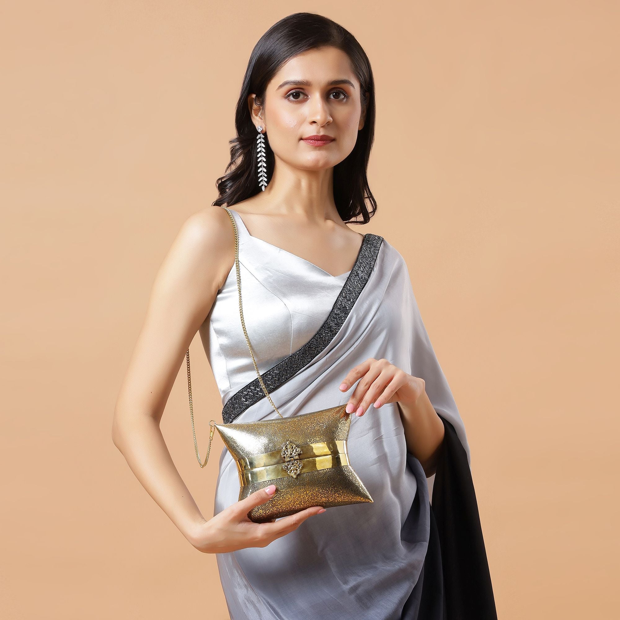 ETHNIC BRASS BAG WITH INTRICATE PATTERN IN GOLD FINISH