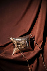 ETHNIC BRASS BAG WITH INTRICATE PATTERN IN SILVER FINISH