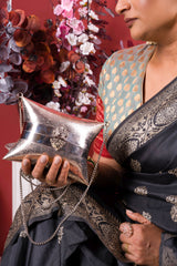 ETHNIC BRASS BAG WITH INTRICATE PATTERN IN SILVER FINISH