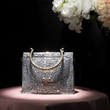 TRIANGLE HAMMERED BRASS BOW BAG IN SILVER