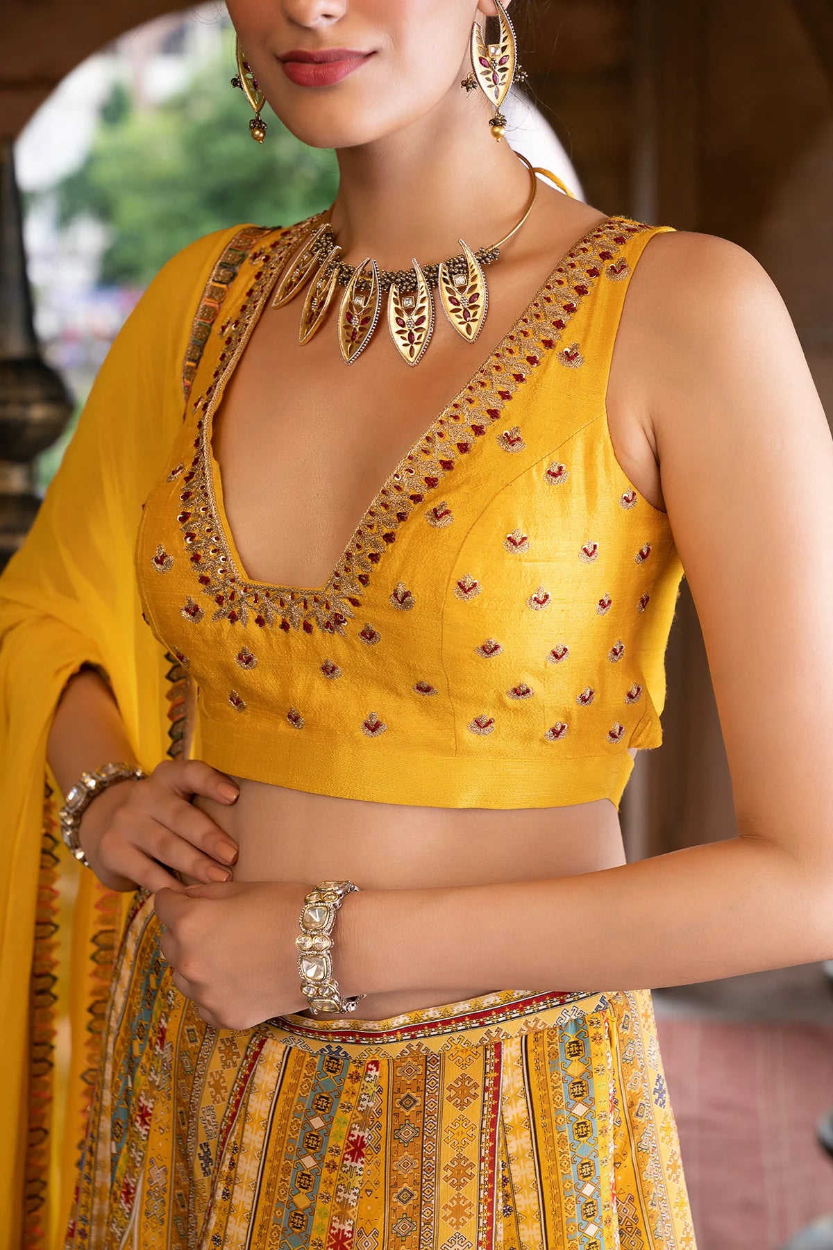 YELLOW LEHENGA AND BLOUSE WITH DUPATTA