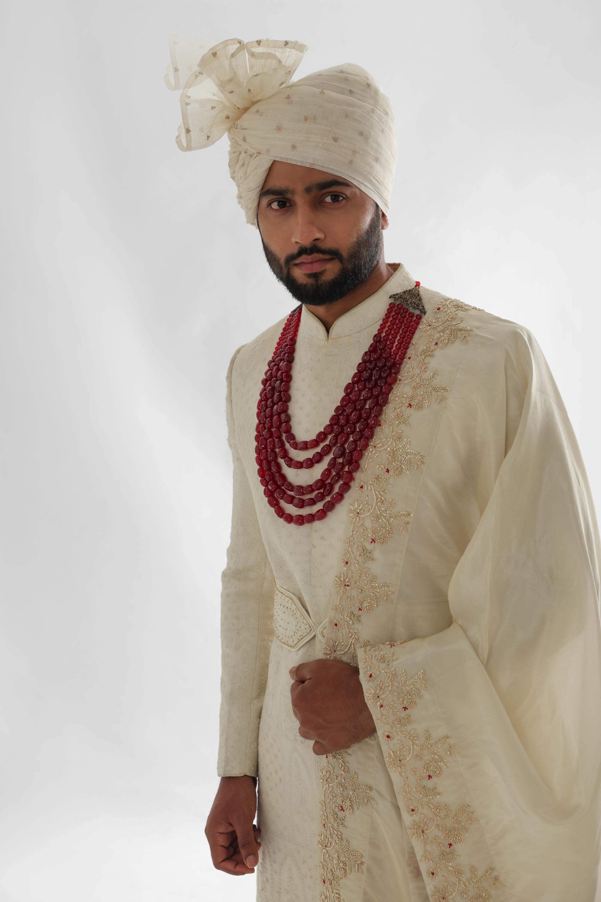 Ivory sherwani set with allover dori work embroidery