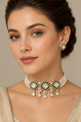 Elegant and classy kundan choker set with green meenakari and pearls