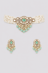 Elegant and classy two tone kundan choker set with mint green stones and pearls