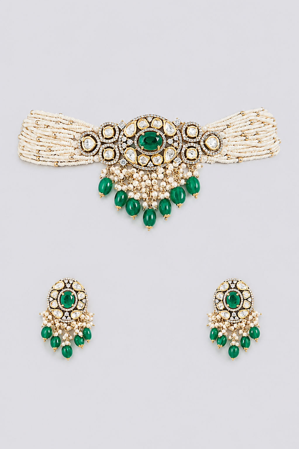 Elegant and classy two tone kundan choker set with green stones and pearls