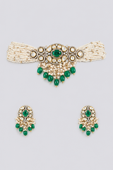 Elegant and classy two tone kundan choker set with green stones and pearls