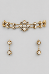 Elegant yet dramatic polki choker set with matching earrings