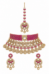 Bold and dramatic polki bridal necklace set with matching earrings and maangtika
