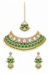 Bold and dramatic polki bridal necklace set with matching earrings and maangtika