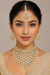 Bold and dramatic polki bridal necklace set with matching earrings and maangtika
