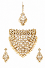 Bold and dramatic polki bridal necklace set with matching earrings and maangtika