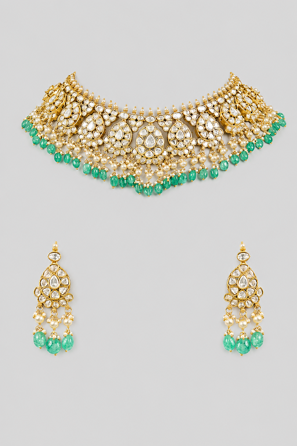Traditional yet classic kundan necklace set with matching earrings