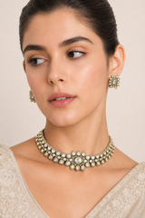 Elegant yet dramatic polki choker set with matching earrings
