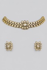 Elegant yet dramatic polki choker set with matching earrings