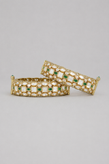 Bold and dramatic polki pair of bangles in two tone finish