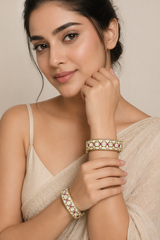 Bold and dramatic polki pair of bangles in two tone finish