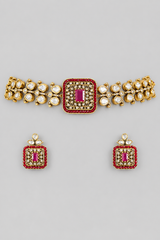 Exclusive and classic two tone finish choker with red stones. It comes with a pair of matching studs