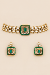 Exclusive and classic two tone finish choker with green stones. It comes with a pair of matching studs.