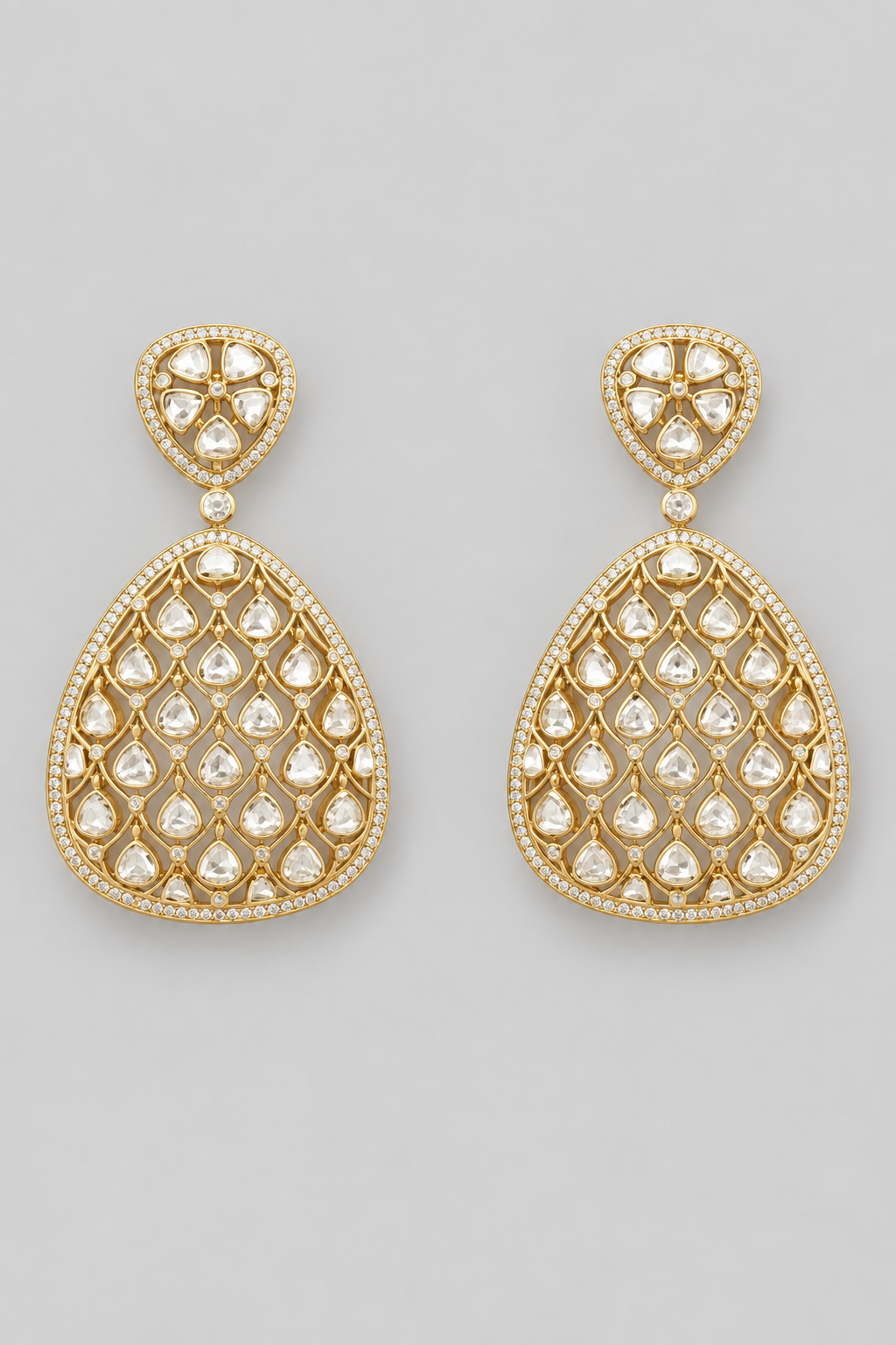 Elegant and versatile pair of kundan polki danglers.