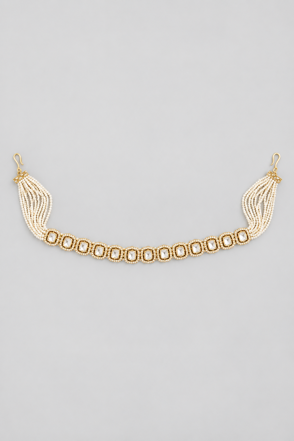 Beautifully arranged dainty kundan polki sheeshpatti with pearl strings