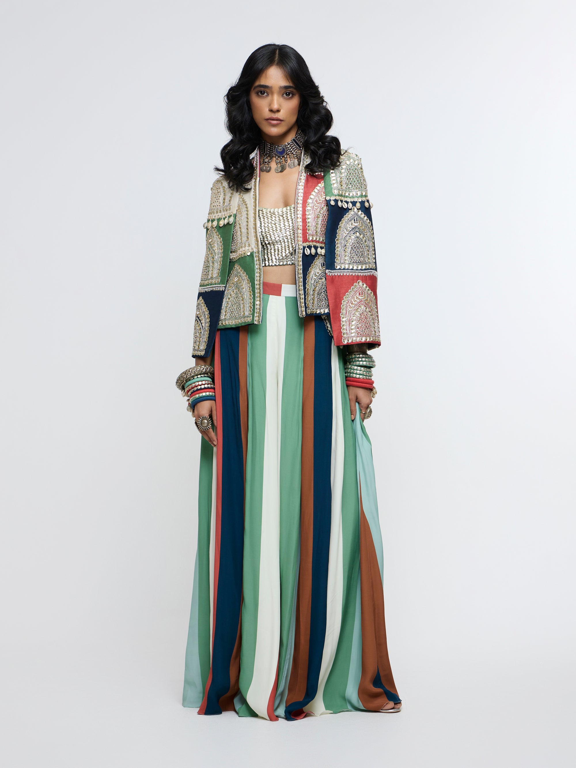 RAJRANGI EMBELLISHED CAPE JACKET PAIRED WITH EMBELLISHED BUSTIER AND PLEATED PANTS