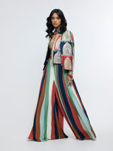 RAJRANGI EMBELLISHED CAPE JACKET PAIRED WITH EMBELLISHED BUSTIER AND PLEATED PANTS