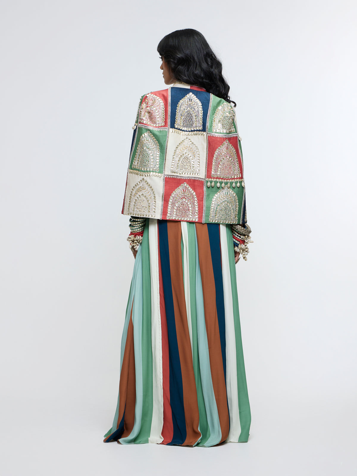 RAJRANGI EMBELLISHED CAPE JACKET PAIRED WITH EMBELLISHED BUSTIER AND PLEATED PANTS