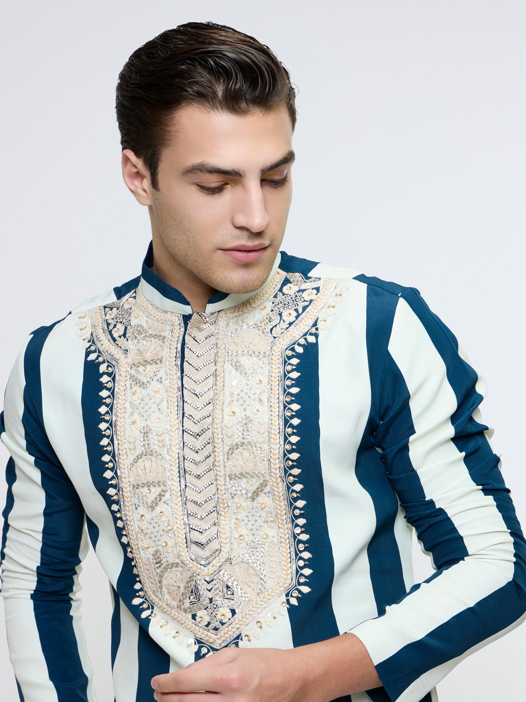 NAYAB STRIPE KURTA WITH EMBROIDERED YOKE PAIRED WITH PANTS