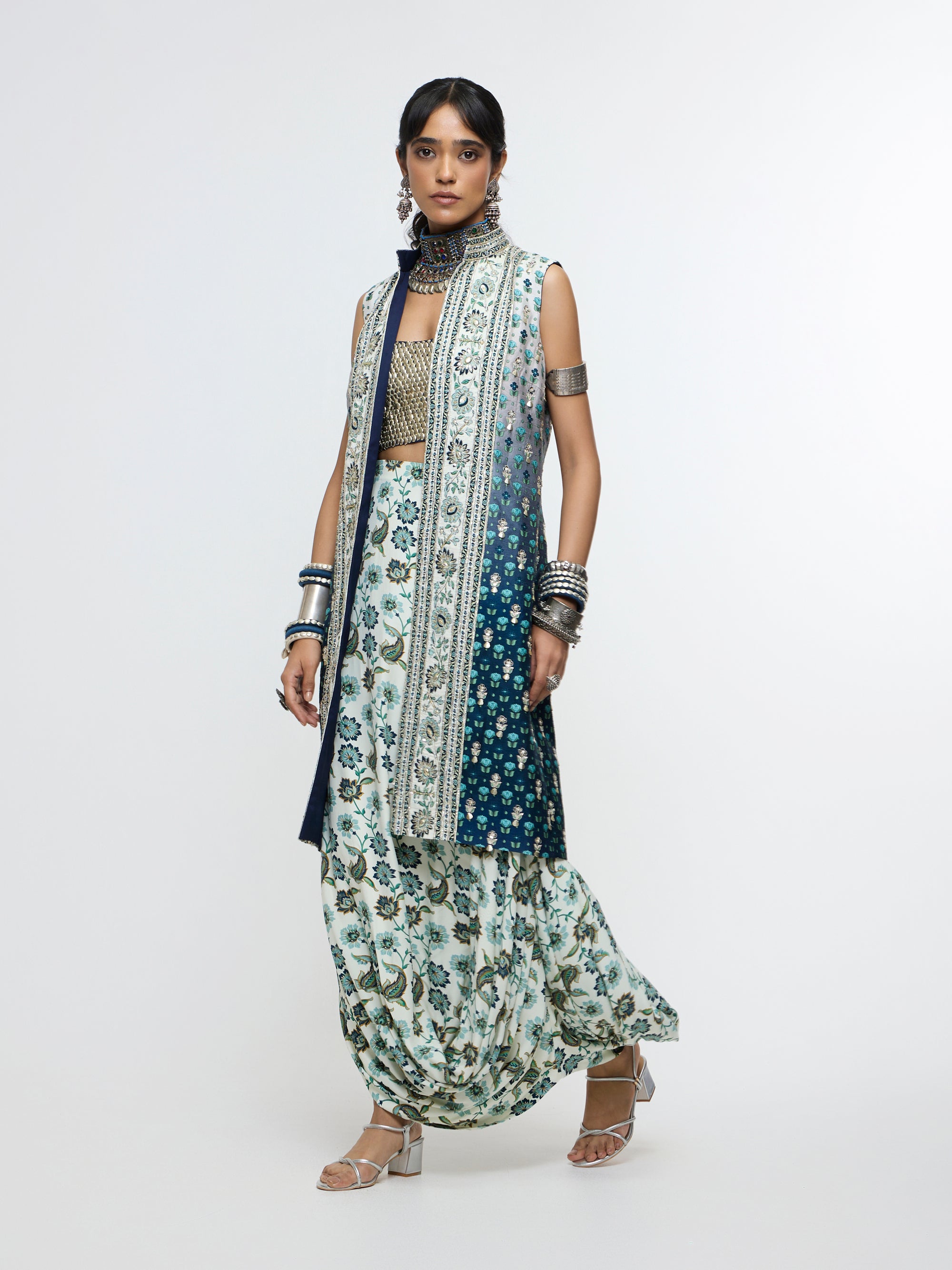 NYSA LONG JACKET PAIRED WITH METALLIC BUSTIER & DRAPE SKIRT