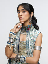 NYSA LONG JACKET PAIRED WITH METALLIC BUSTIER & DRAPE SKIRT