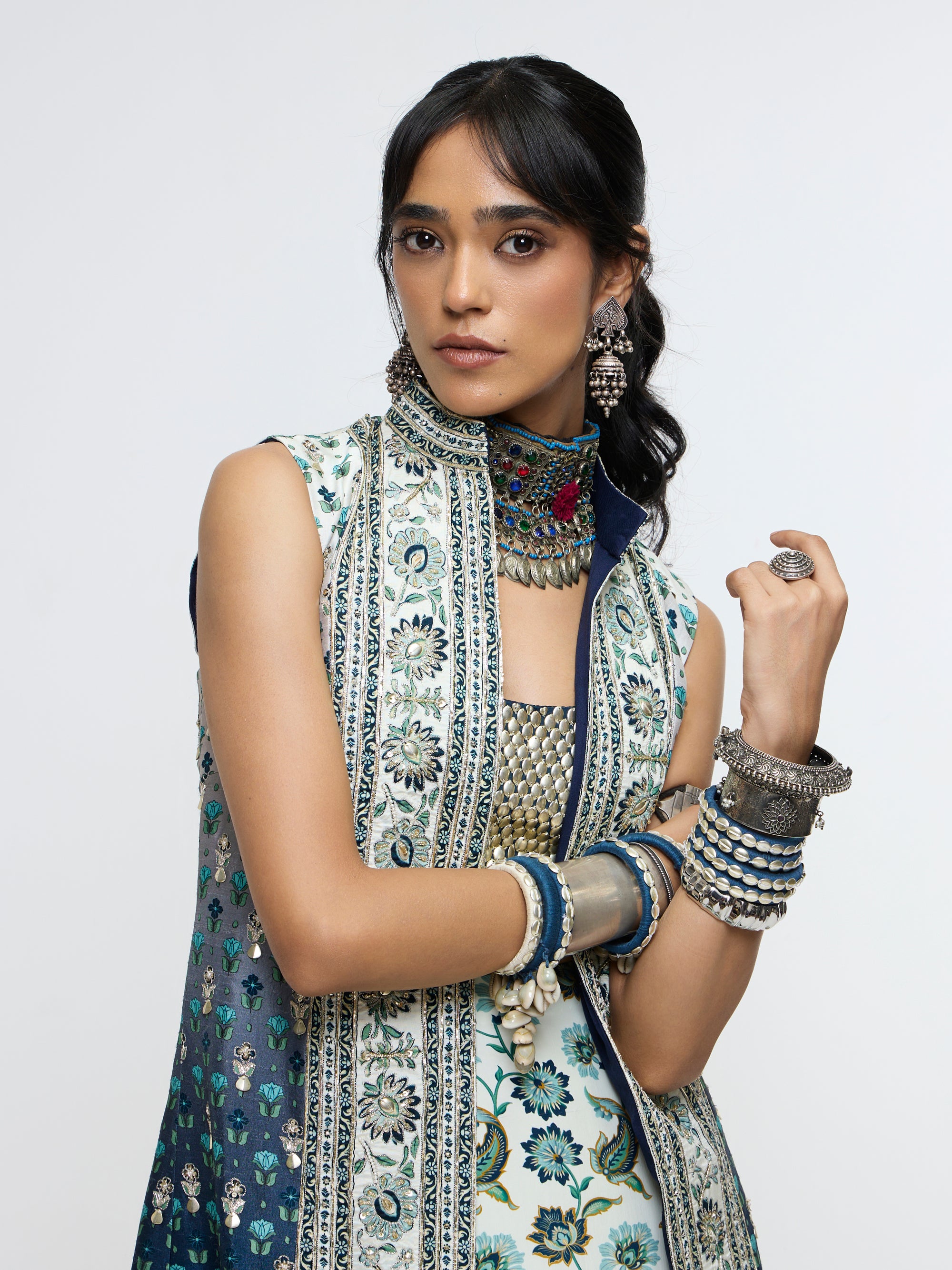 NYSA LONG JACKET PAIRED WITH METALLIC BUSTIER & DRAPE SKIRT