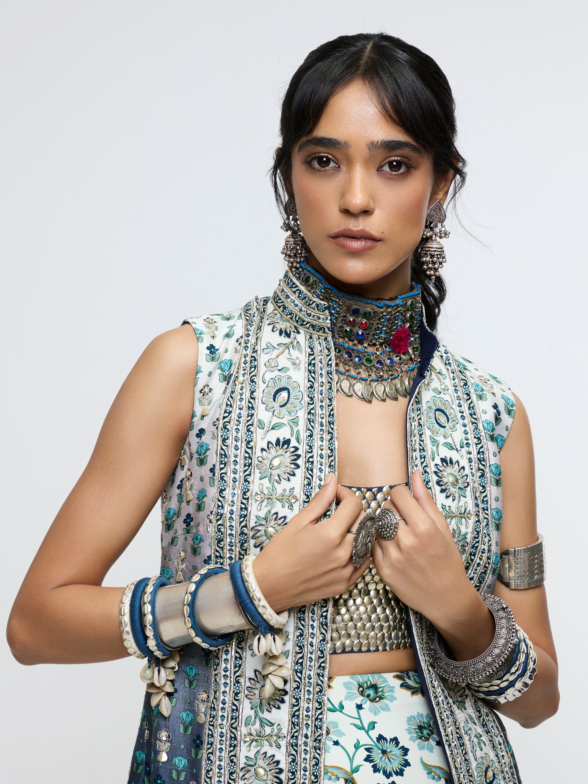 NYSA LONG JACKET PAIRED WITH METALLIC BUSTIER & DRAPE SKIRT