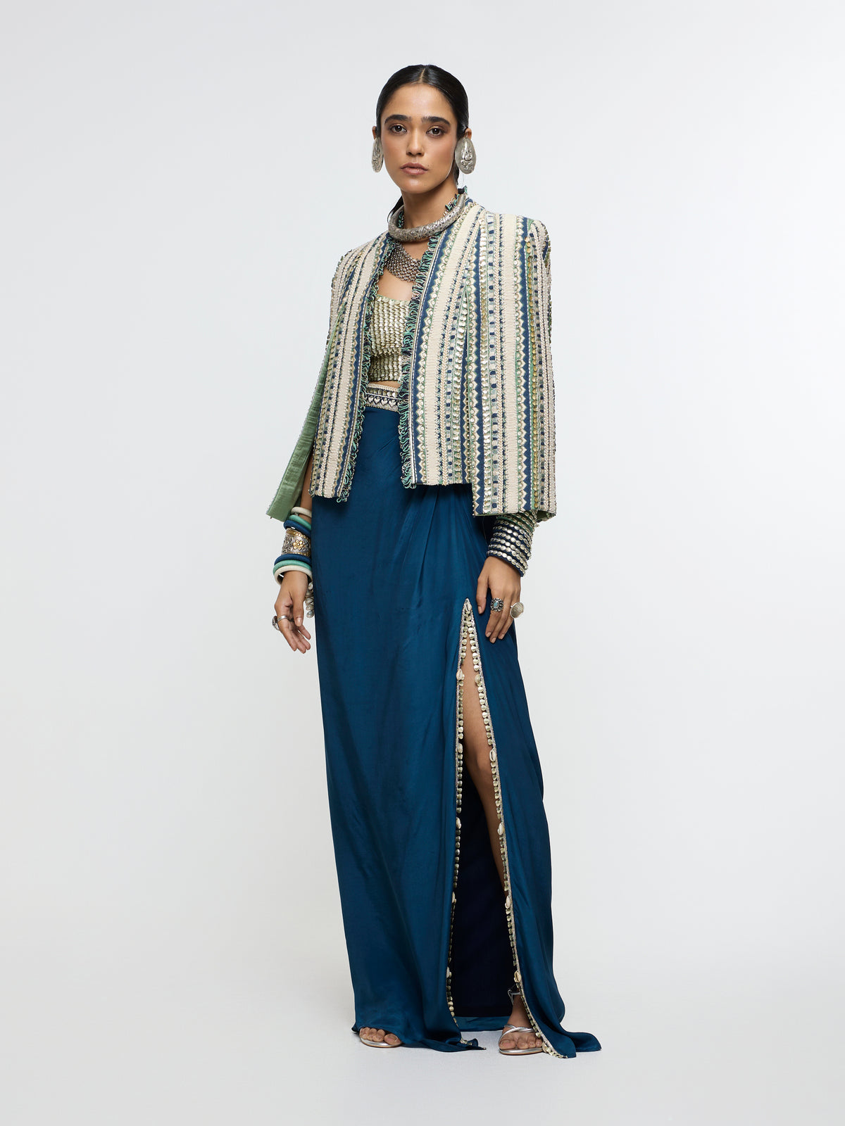INAAYA EMBLLISHED & TEXTURED JACKET PAIRED WITH METALLIC BUSTIER AND SLIT SKIRT
