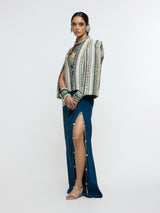INAAYA EMBLLISHED & TEXTURED JACKET PAIRED WITH METALLIC BUSTIER AND SLIT SKIRT