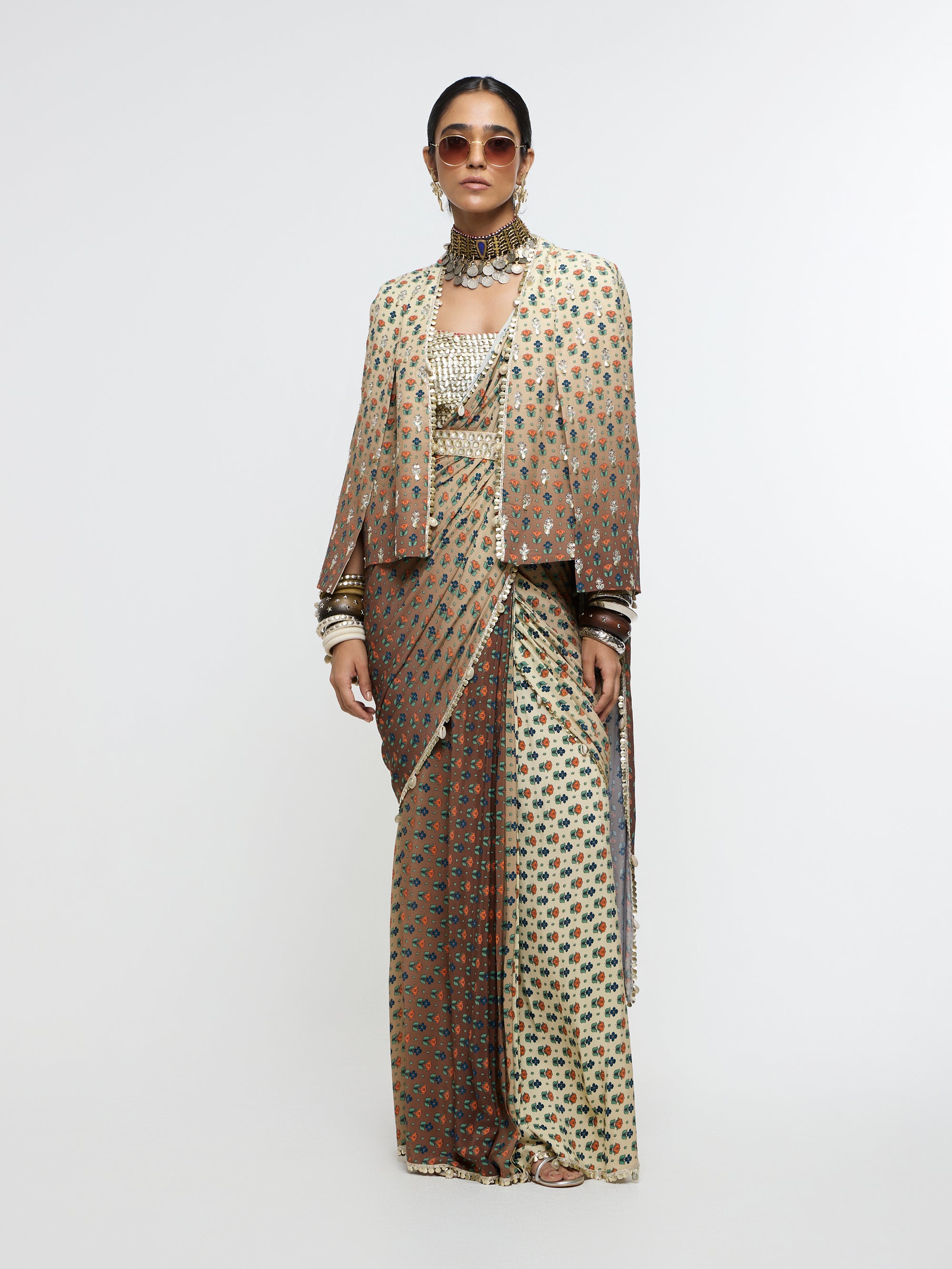 MAHNOOR CAPE JACKET PAIRED WITH METALLIC BUSTIER & DRAPE SAREE