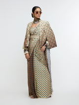 MAHNOOR CAPE JACKET PAIRED WITH METALLIC BUSTIER & DRAPE SAREE