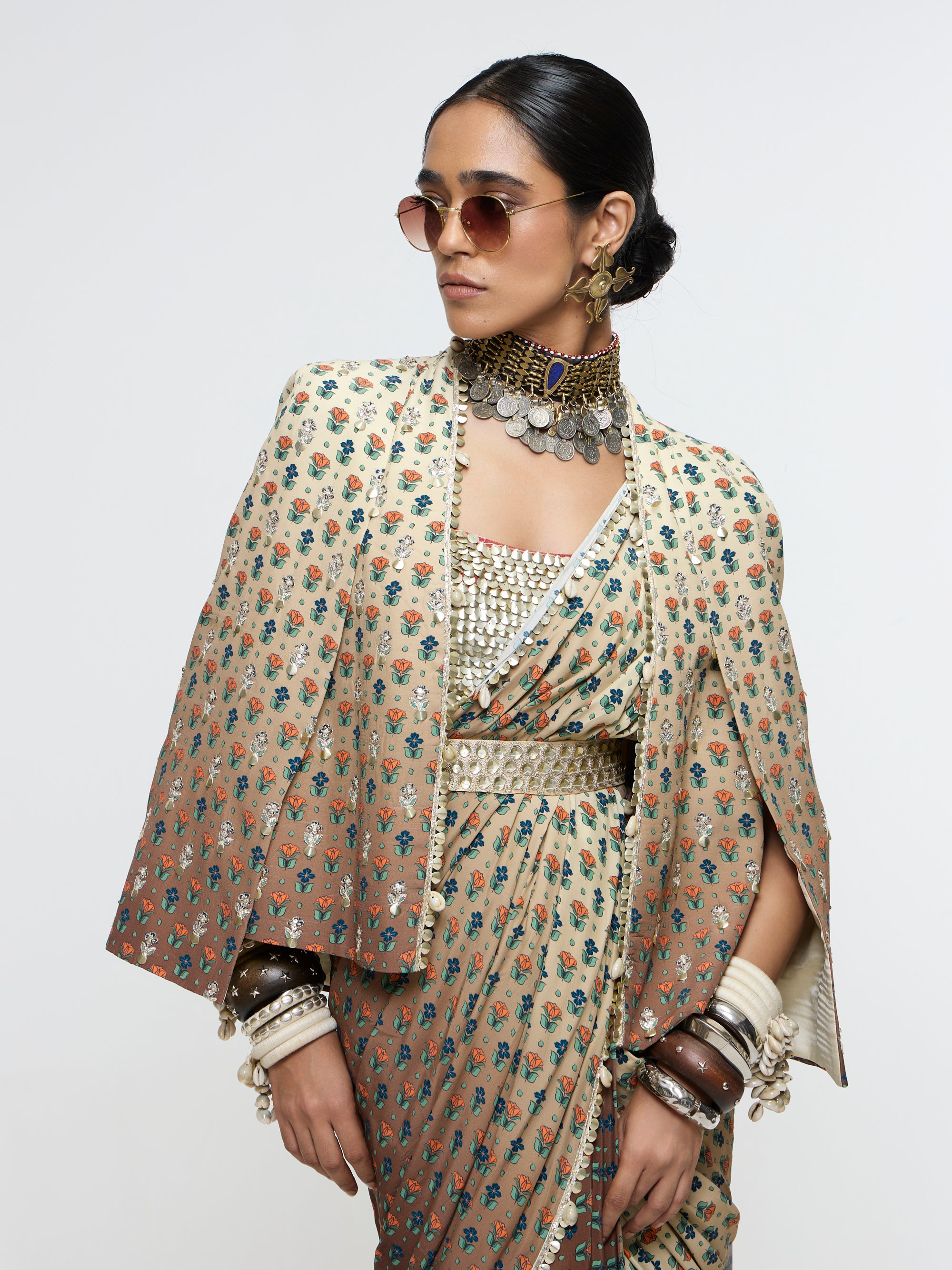 MAHNOOR CAPE JACKET PAIRED WITH METALLIC BUSTIER & DRAPE SAREE