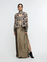 AMER JACKET PAIRED WITH EMBELLISHED BUSTIER AND HIGH-SLIT SKIRT