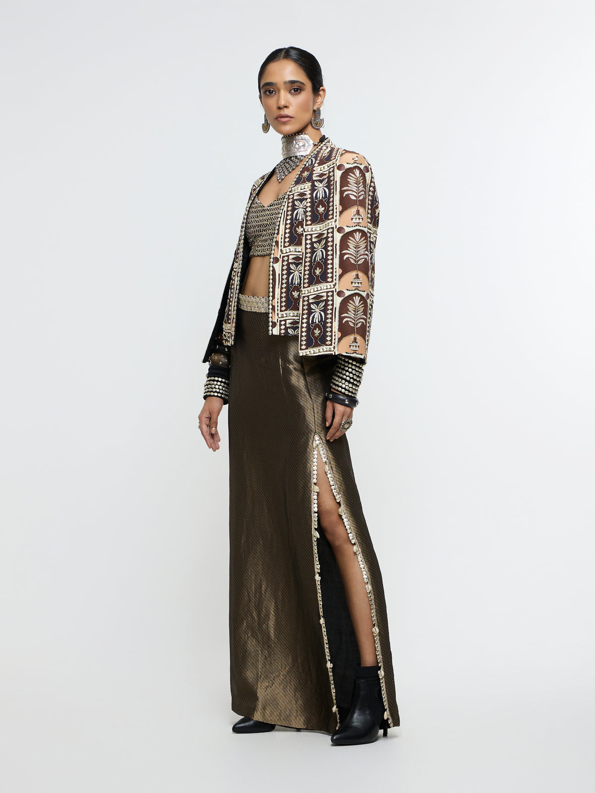 AMER JACKET PAIRED WITH EMBELLISHED BUSTIER AND HIGH-SLIT SKIRT