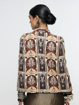 AMER JACKET PAIRED WITH EMBELLISHED BUSTIER AND HIGH-SLIT SKIRT