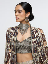 AMER JACKET PAIRED WITH EMBELLISHED BUSTIER AND HIGH-SLIT SKIRT
