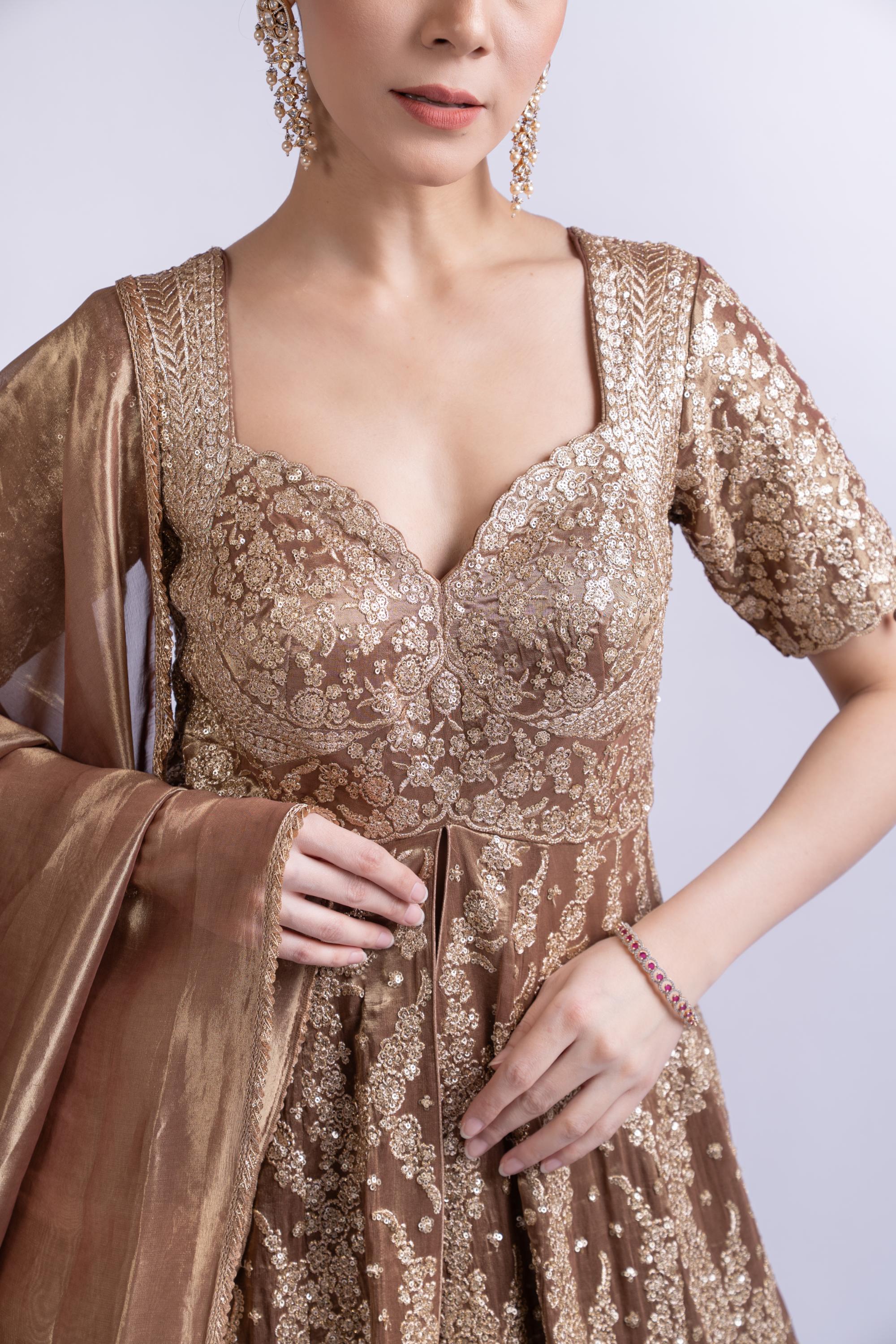 Regal Gold Embroidered Lehenga Set with Cape & Dupatta