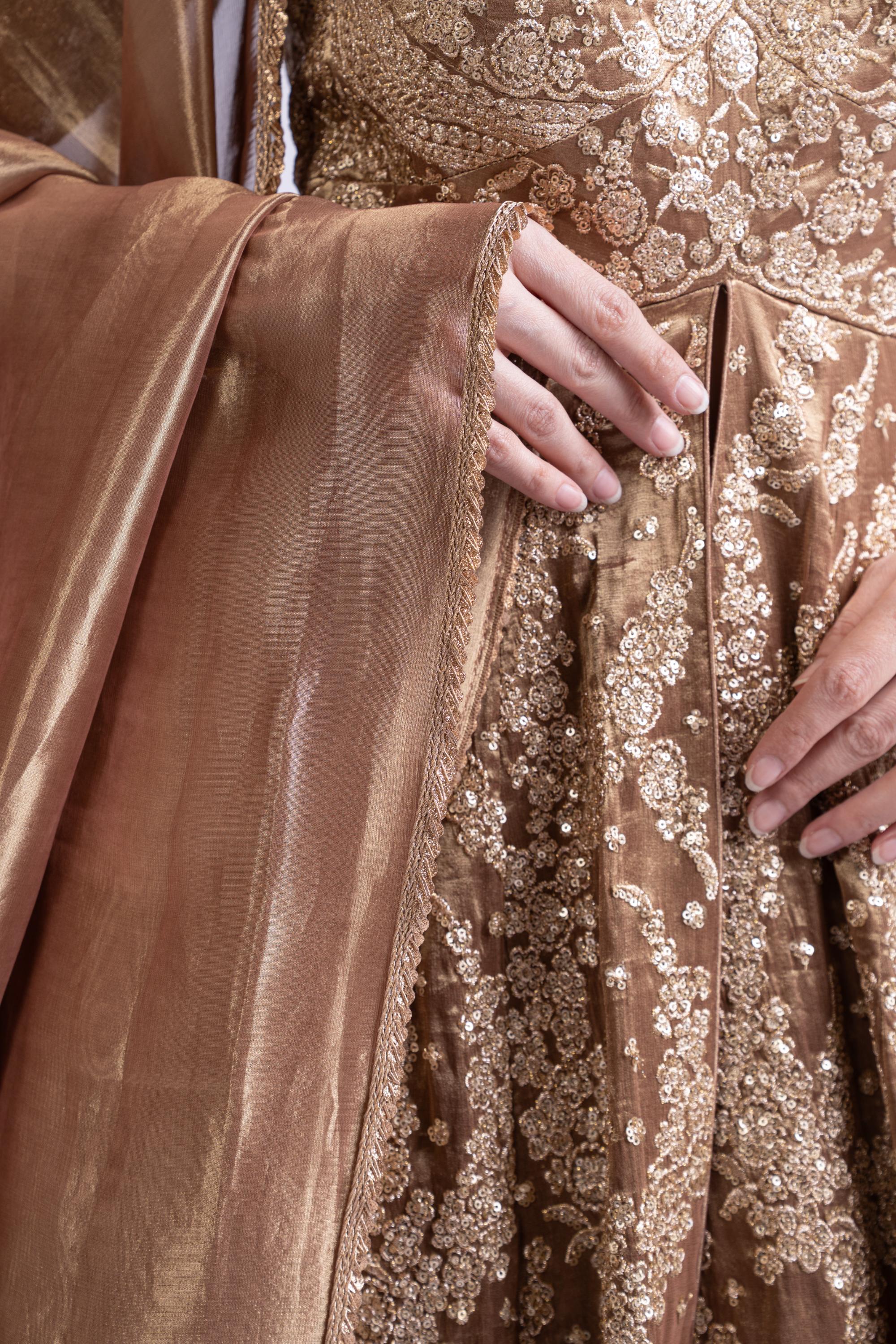 Regal Gold Embroidered Lehenga Set with Cape & Dupatta