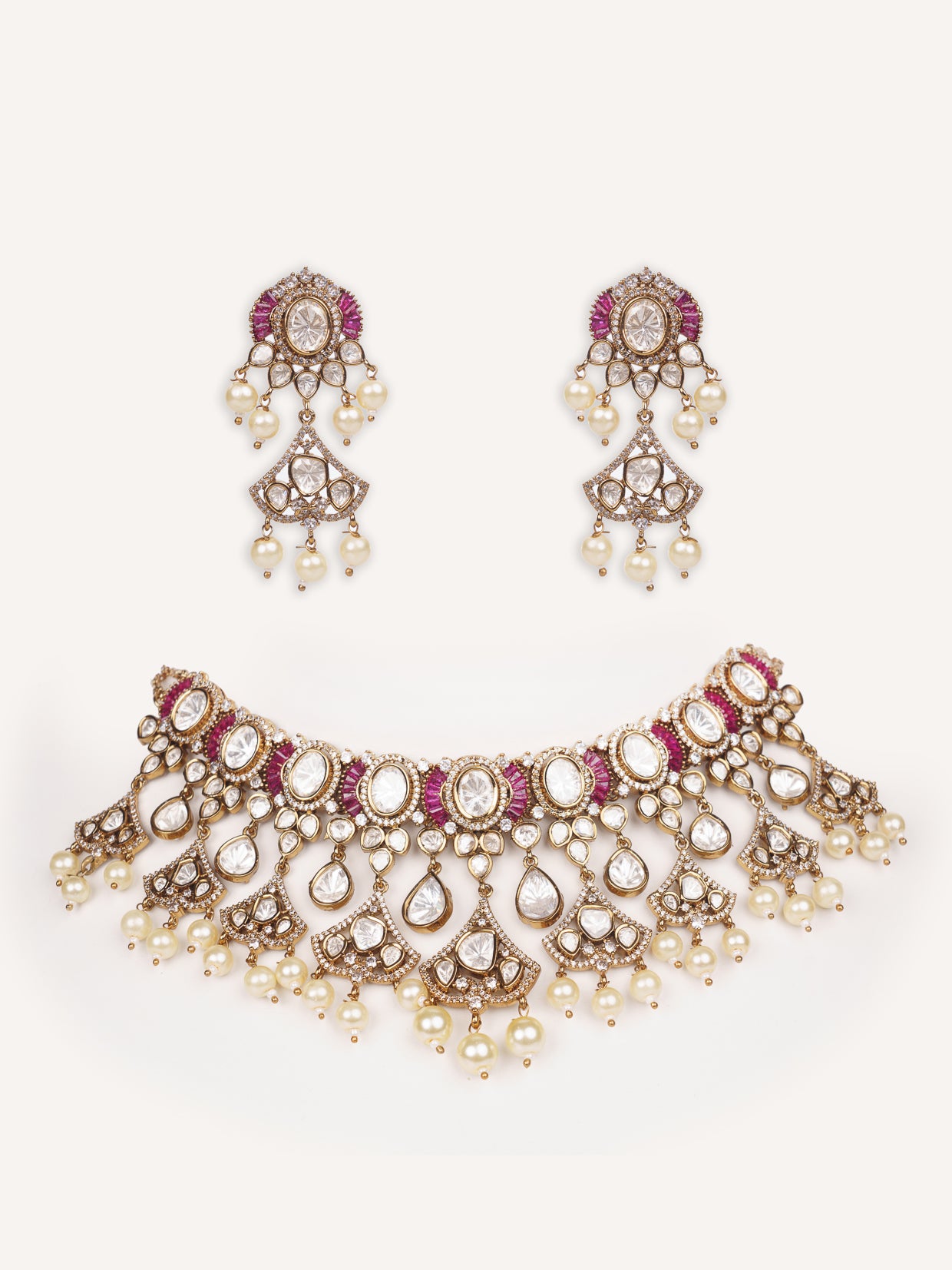 Dramatic and classy two tone kundan polki stone necklace set with matching earrings