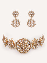 Traditional yet dramatic kundan choker with matching earrings
