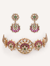 Traditional yet dramatic kundan choker with matching earrings